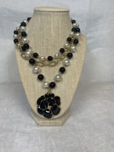 black flower detail necklace