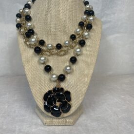 black flower detail necklace
